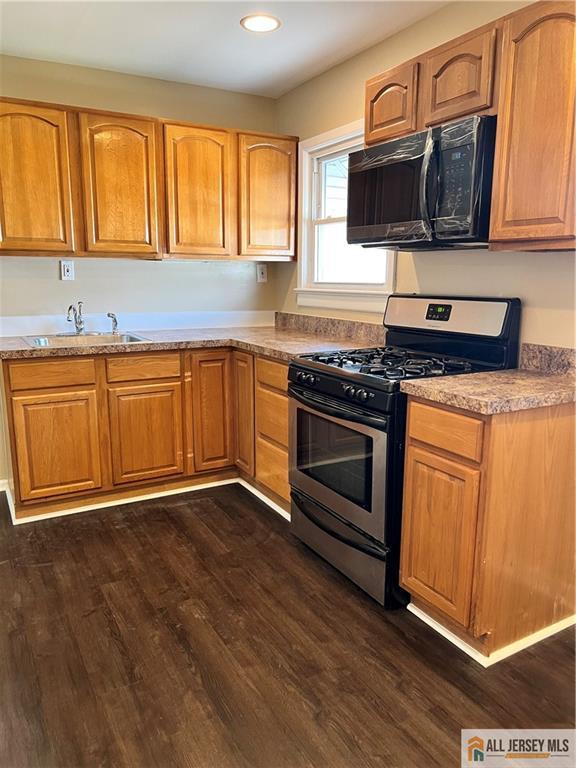 3257 Washington Road Sayreville, NJ 08859 - Photo 6 of 16 a kitchen with granite countertop cabinets stainless steel appliances and a sink