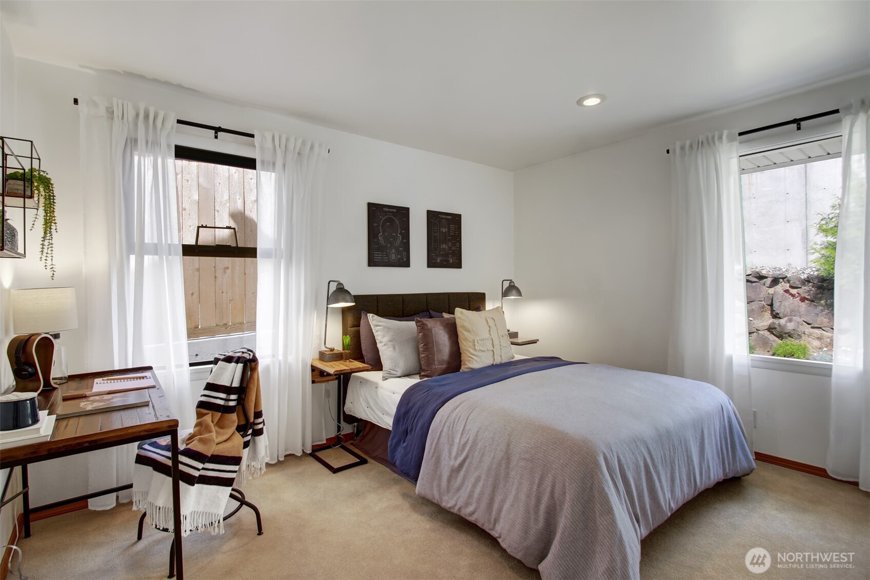 3236 32nd Avenue West Seattle, WA 98199 - Photo 11 of 33 a bedroom with a bed and a window