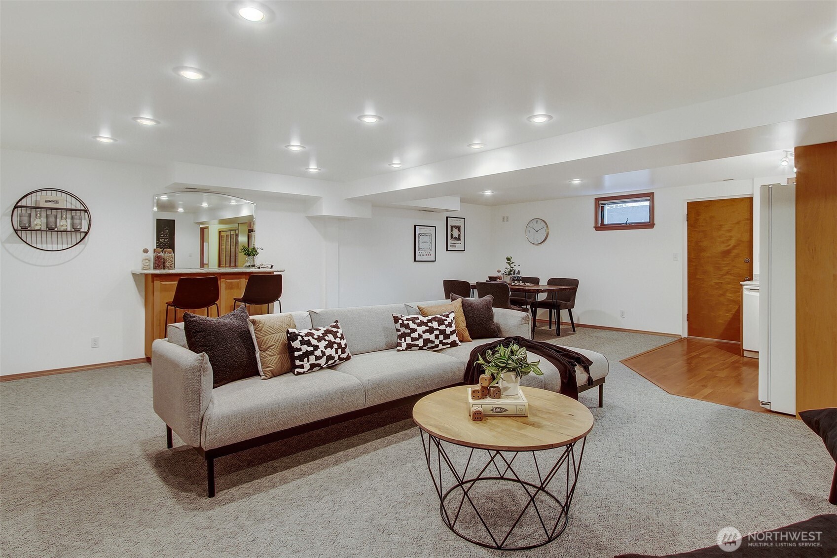 3236 32nd Avenue West Seattle, WA 98199 - Photo 14 of 33 a living room with furniture and a wooden floor