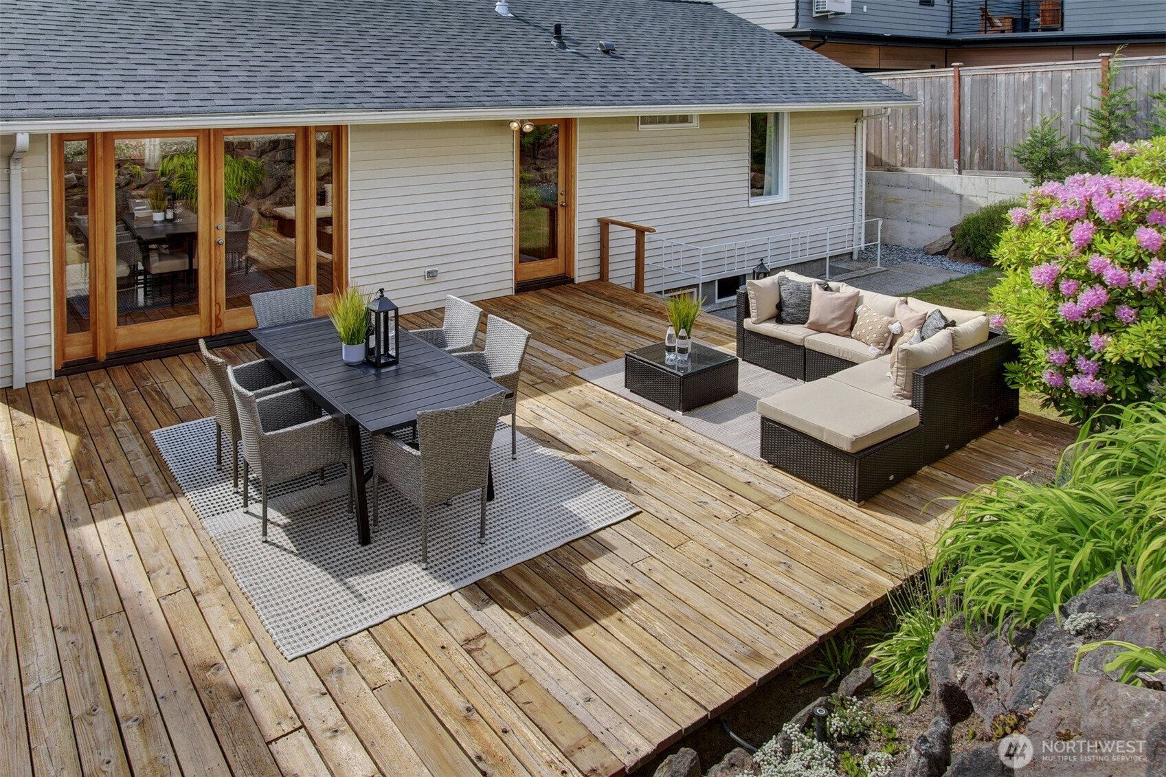3236 32nd Avenue West Seattle, WA 98199 - Photo 21 of 33 a view of a patio with couches and potted plants
