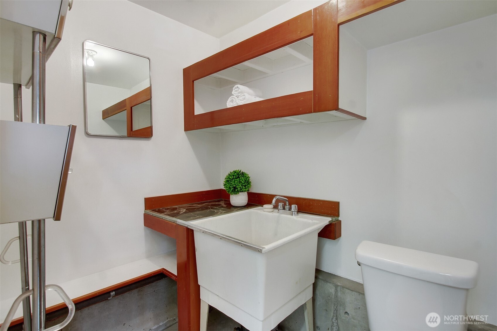 3236 32nd Avenue West Seattle, WA 98199 - Photo 27 of 33 a room that has a table and a stove in it