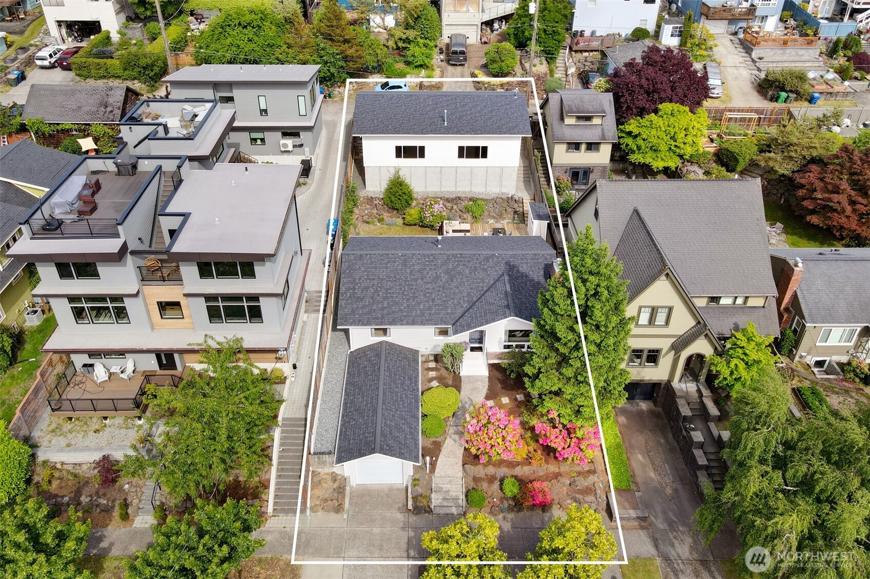 3236 32nd Avenue West Seattle, WA 98199 - Photo 29 of 33 an aerial view of multiple houses with yard