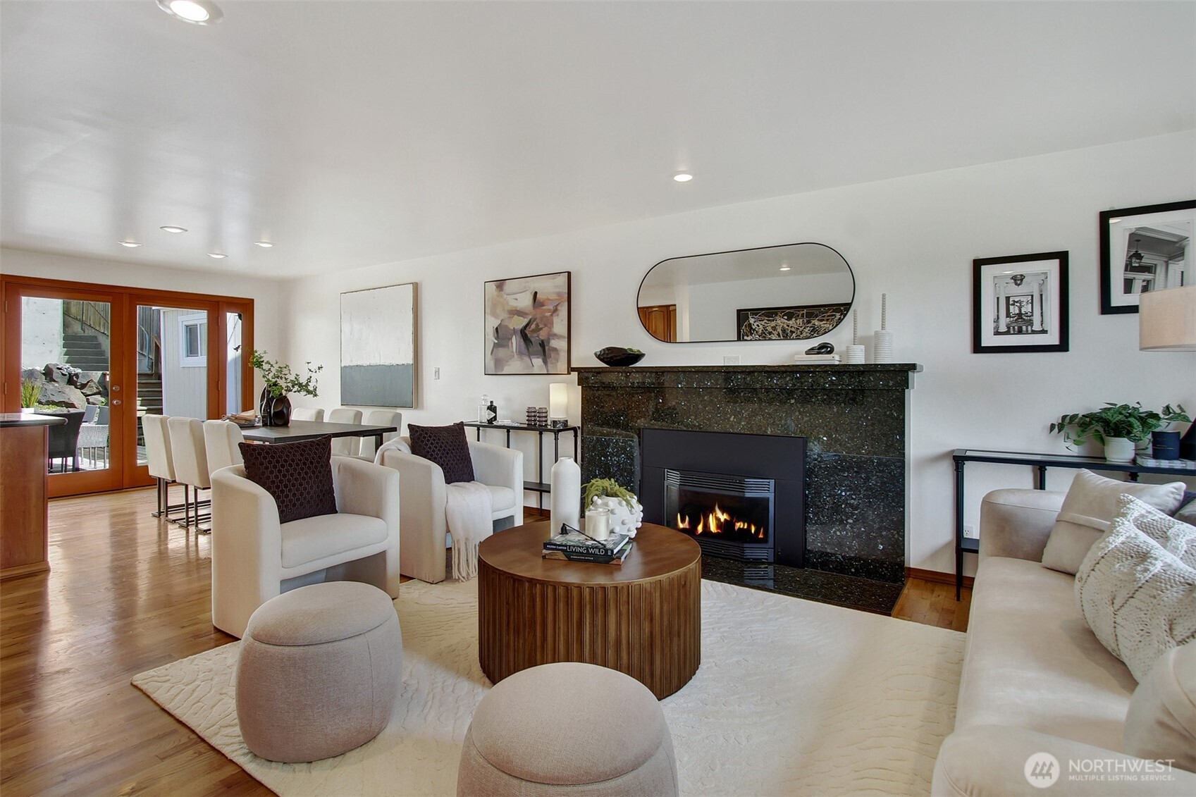 3236 32nd Avenue West Seattle, WA 98199 - Photo 3 of 33 a living room with furniture and a fireplace