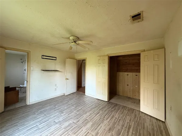 a bathroom with a sink and shower