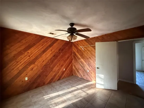 a view of empty room with windows