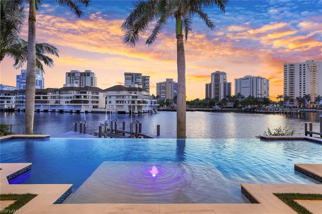 309 Neapolitan Way Naples, FL 34103 - Photo 3 of 33 a view of a terrace with city view