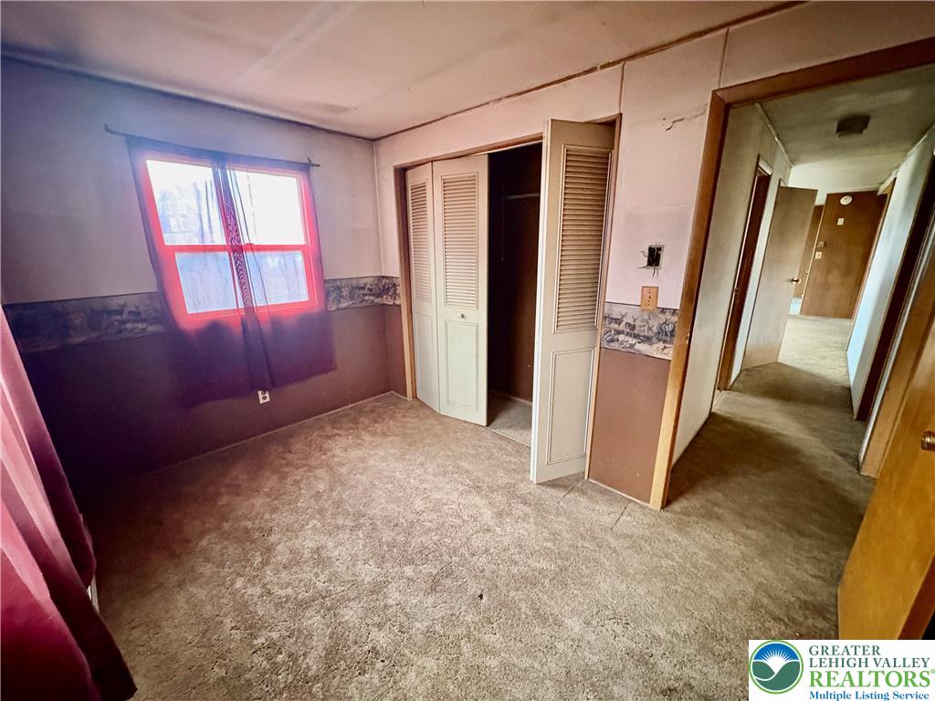 211 Fireline Road Bowmanstown, PA 18071 - Photo 11 of 13 an empty room with windows