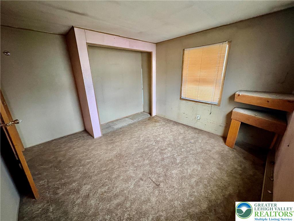 211 Fireline Road Bowmanstown, PA 18071 - Photo 12 of 13 a view of an empty room with a window