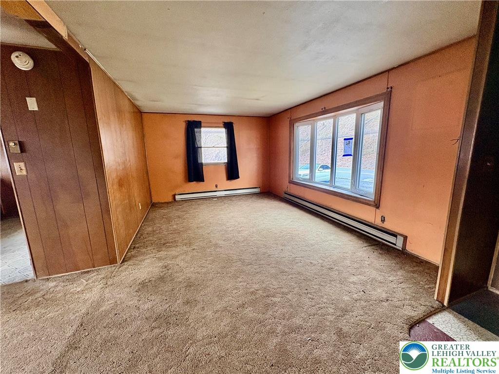 211 Fireline Road Bowmanstown, PA 18071 - Photo 7 of 13 an empty room with windows