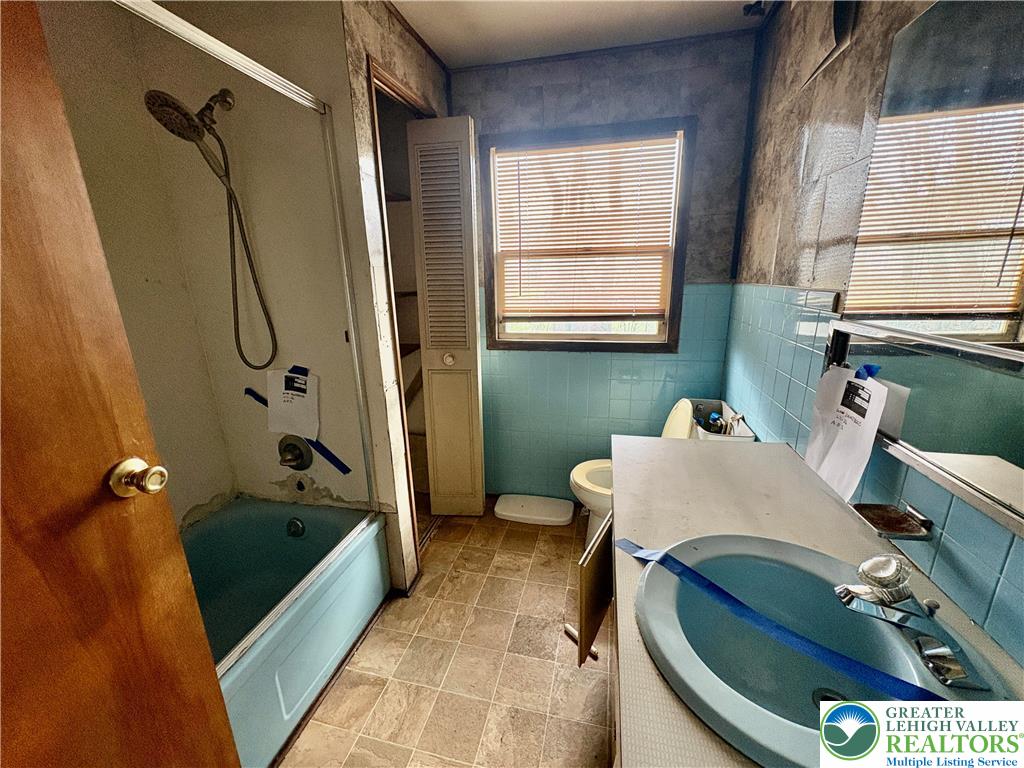 211 Fireline Road Bowmanstown, PA 18071 - Photo 9 of 13 a bathroom with a sink toilet and shower