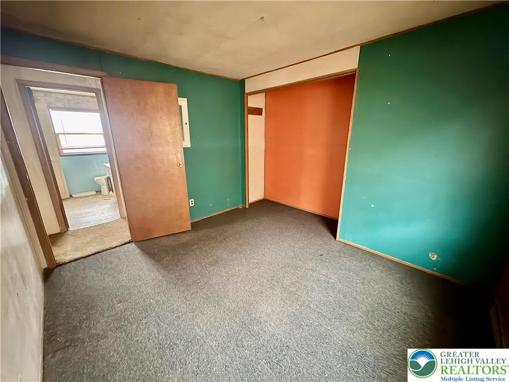 211 Fireline Road Bowmanstown, PA 18071 - Photo 10 of 13 an empty room with windows