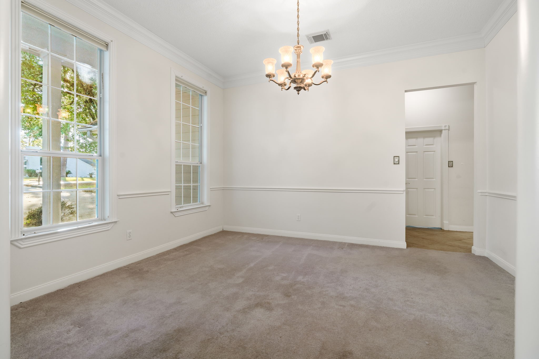 11506 Walden Road Montgomery, TX 77356 - Photo 12 of 50 a view of an empty room with a window