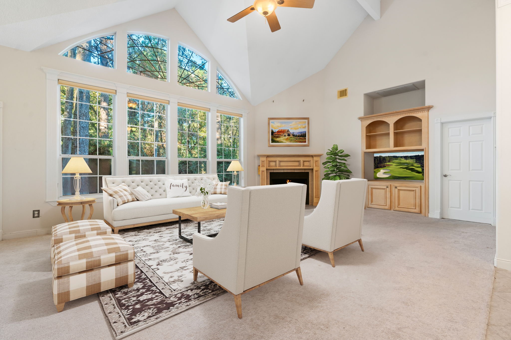 11506 Walden Road Montgomery, TX 77356 - Photo 2 of 50 Virtually staged Family room! The wall of magnificent windows is beautiful. Note the wooded back yard area!