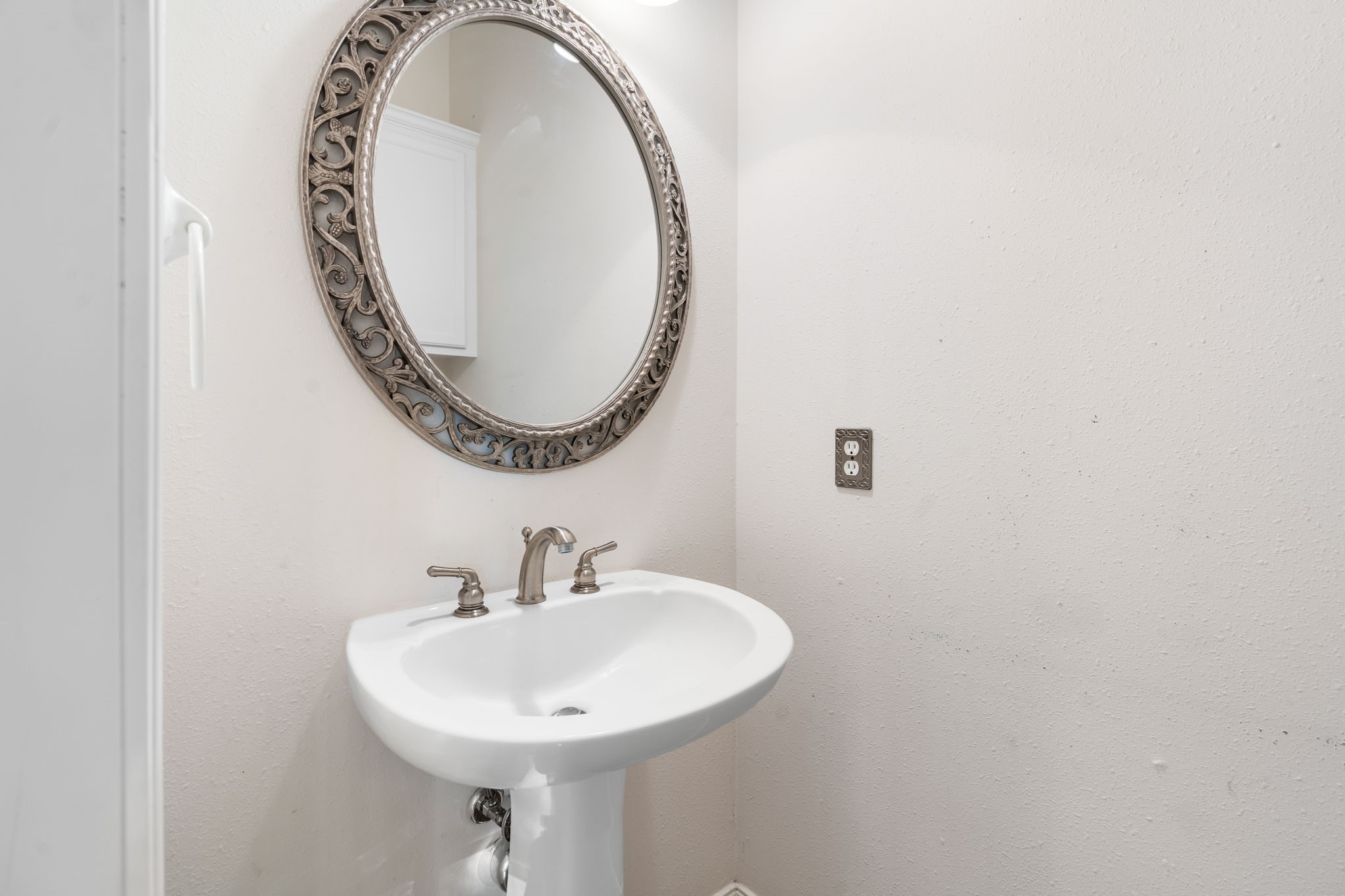 11506 Walden Road Montgomery, TX 77356 - Photo 23 of 50 a bathroom with a sink and a mirror