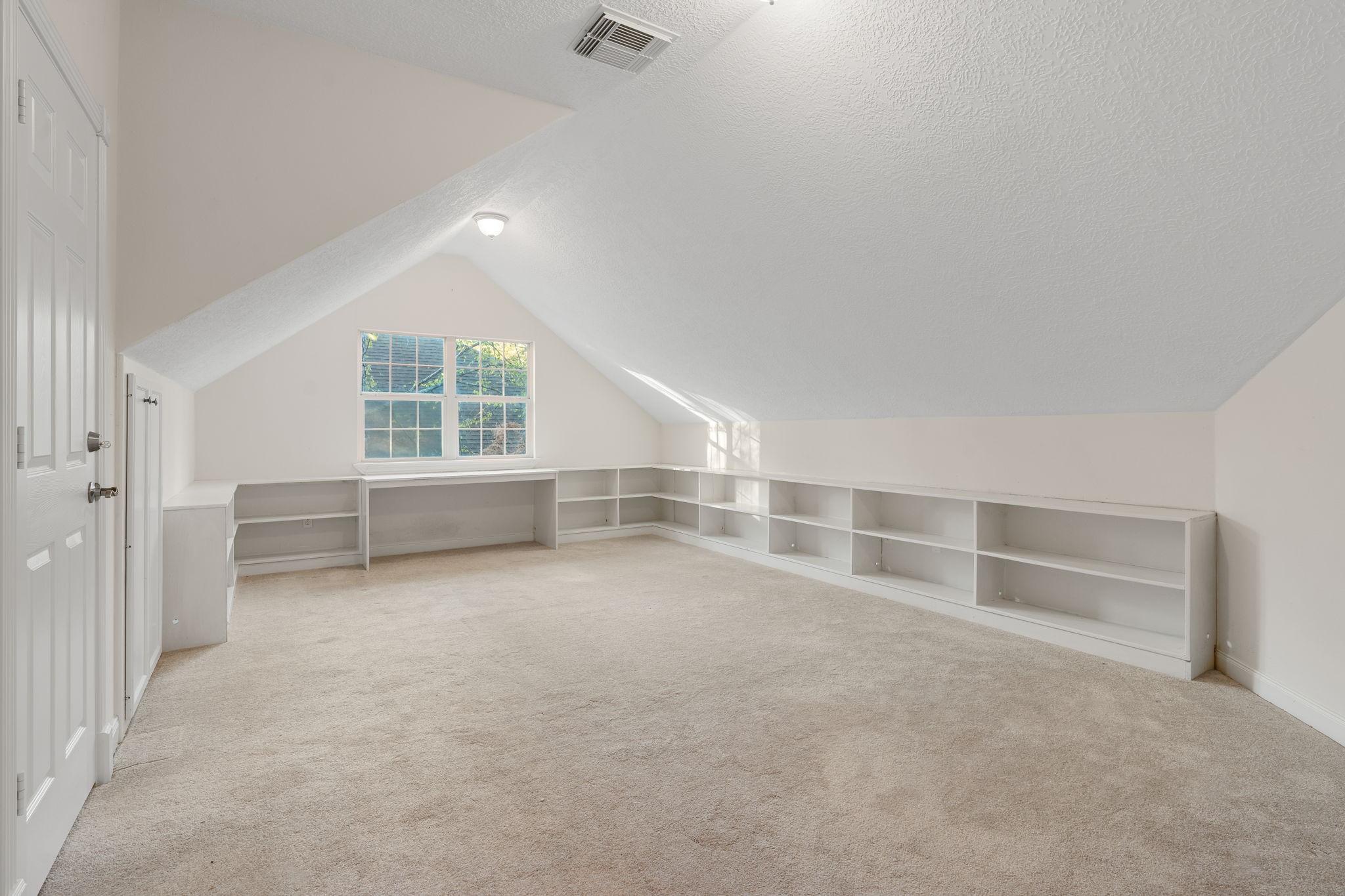 11506 Walden Road Montgomery, TX 77356 - Photo 26 of 50 Vacant Flex/Game room has nice built-ins and attic access.