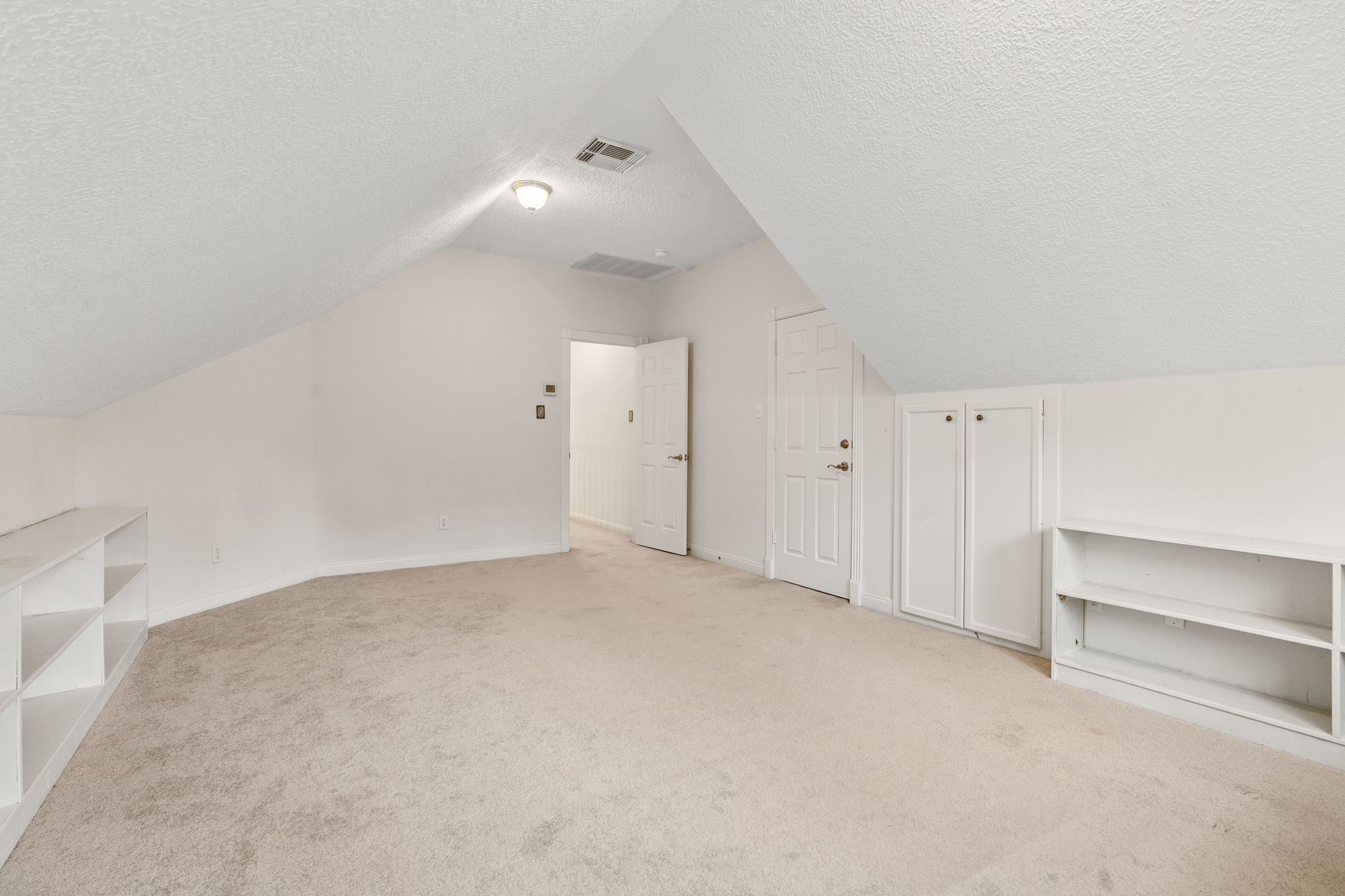 11506 Walden Road Montgomery, TX 77356 - Photo 27 of 50 Entry side of Flex/Game room has attic access doors.