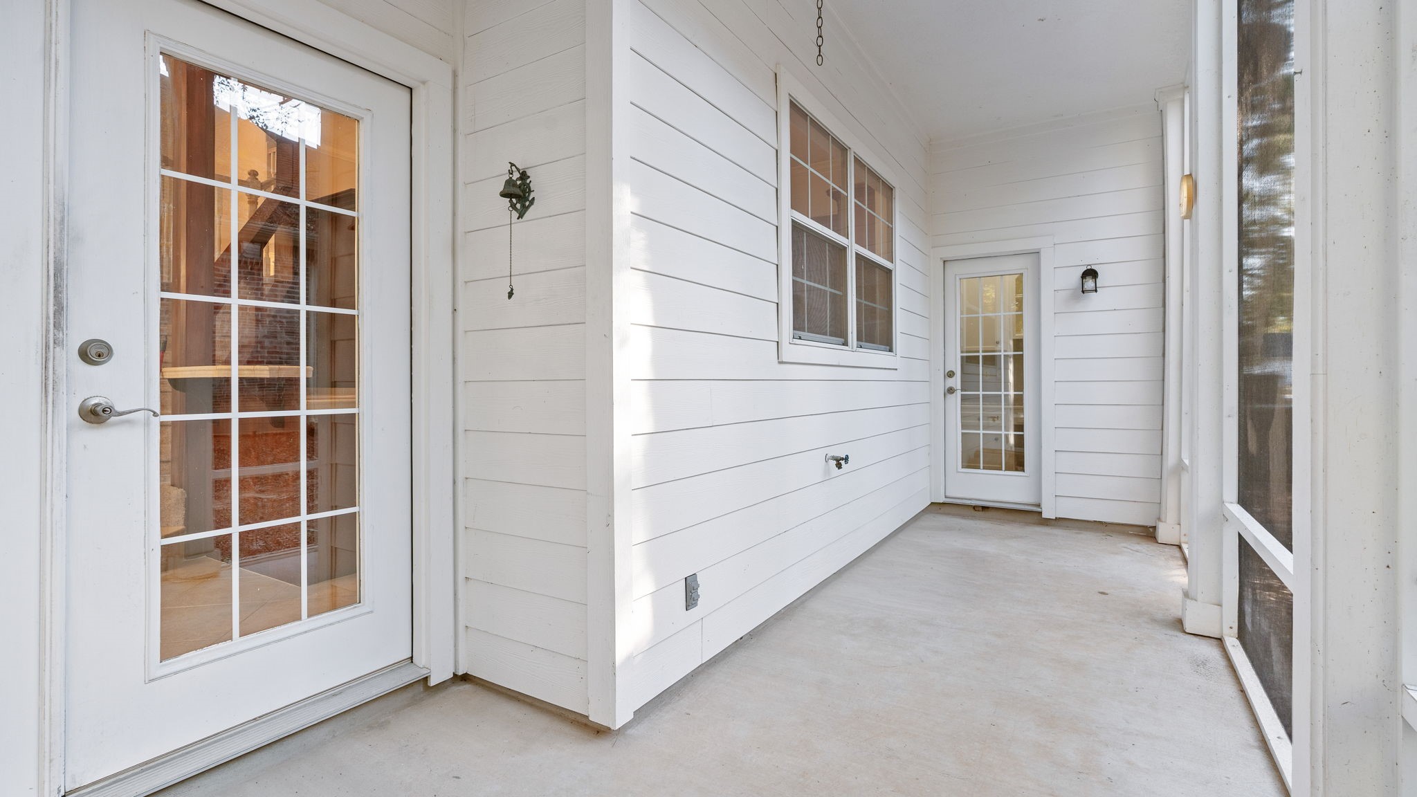 11506 Walden Road Montgomery, TX 77356 - Photo 34 of 50 Side screened porch has access from the kitchen/breakfast area as well as the desk area in utility room.