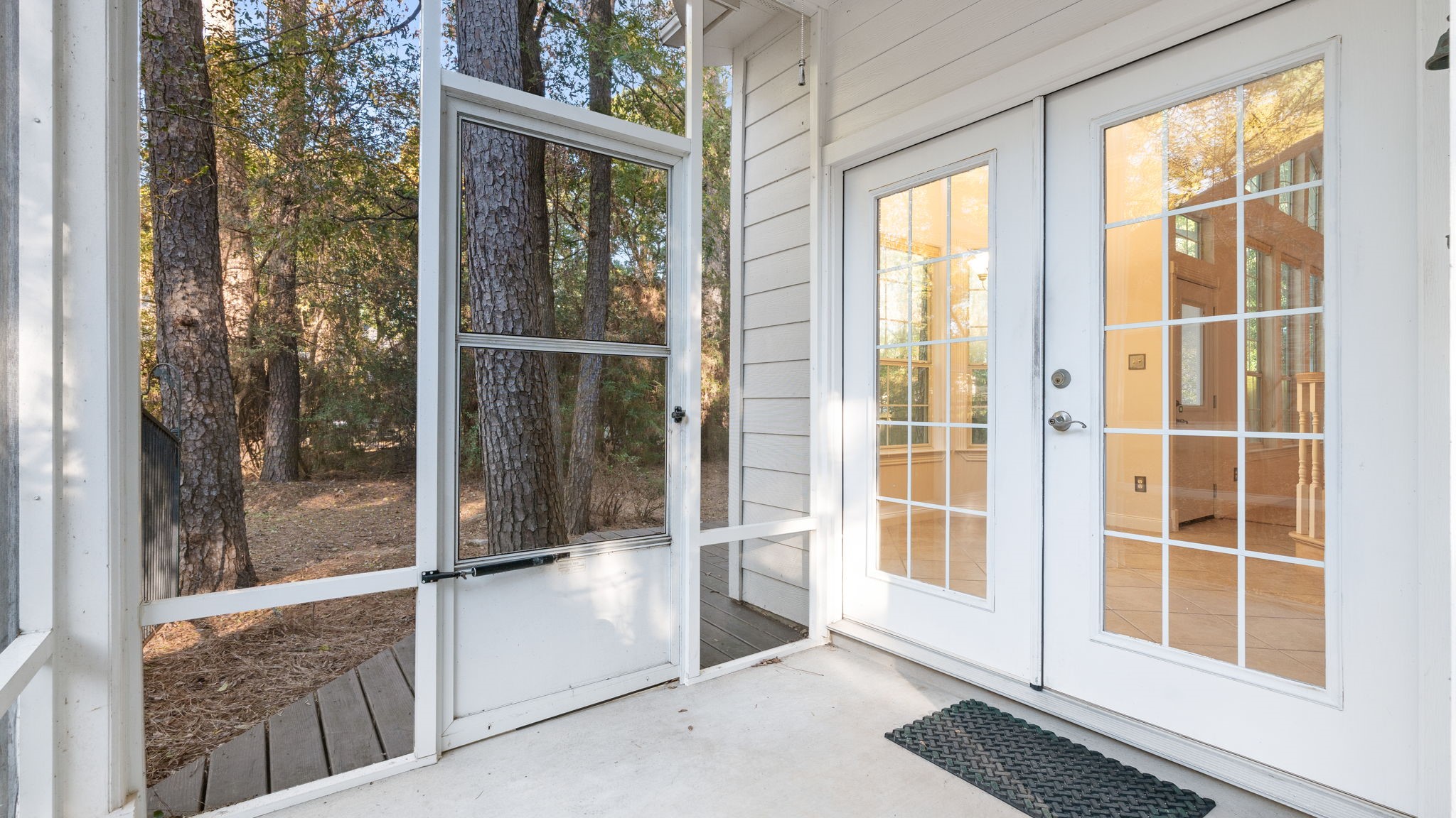 11506 Walden Road Montgomery, TX 77356 - Photo 35 of 50 Side screened porch to back yard.
