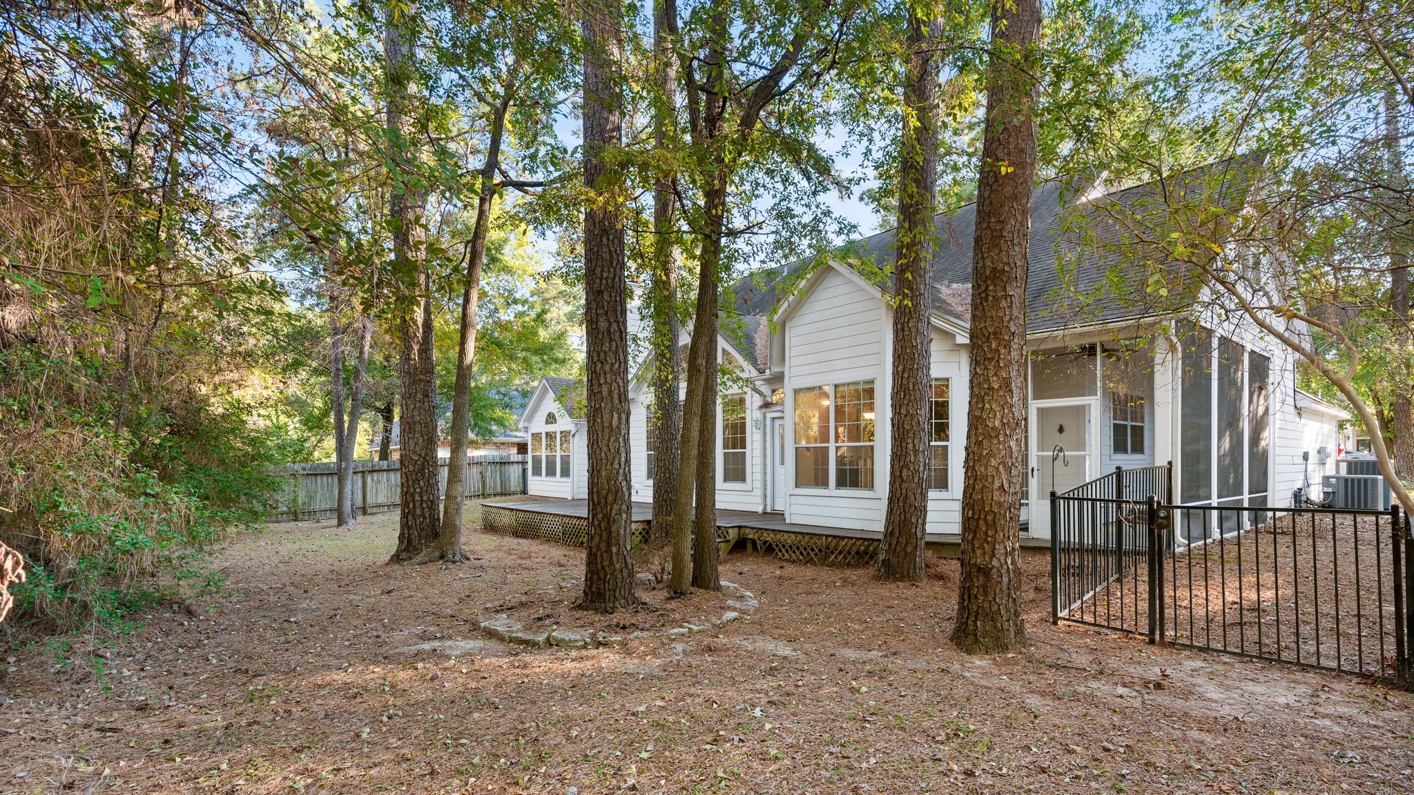 11506 Walden Road Montgomery, TX 77356 - Photo 39 of 50 a view of a house with a tree in the forest