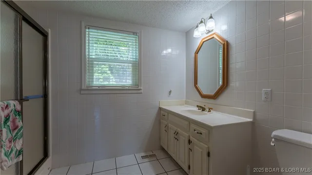 $1,350,000 | 1265 Singing Oaks Drive, Sunrise Beach, MO 65079