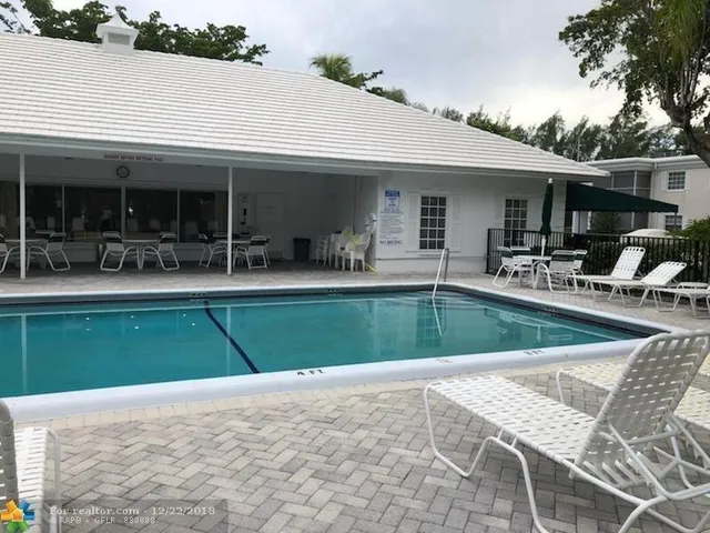a view of outdoor space with seating area and furniture