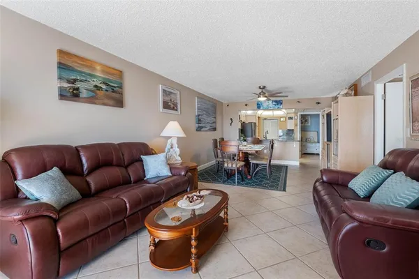a view of a car is parked in front of a building