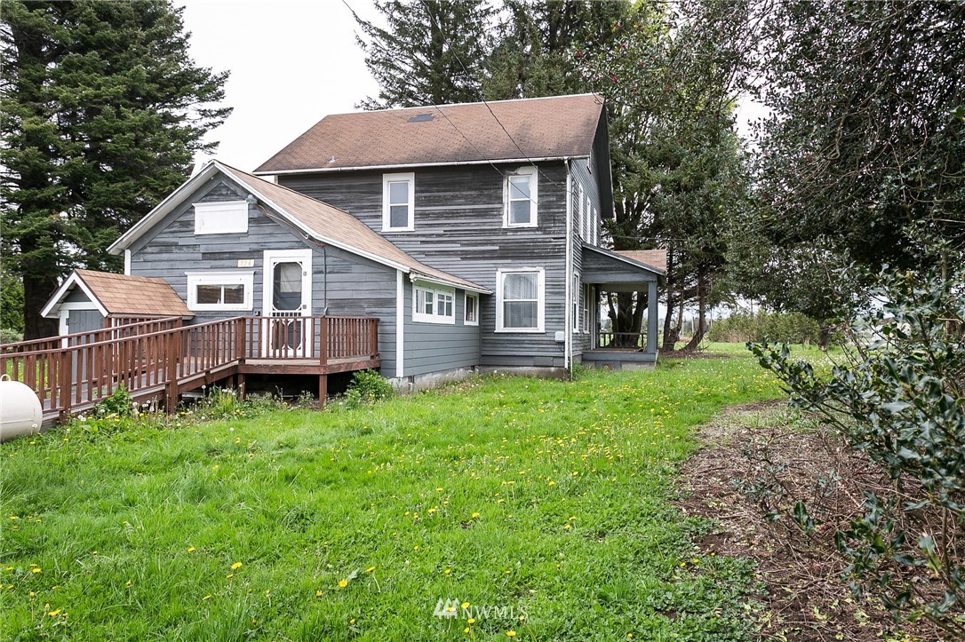 776 West Smith Road Bellingham, WA 98226 - Photo 2 of 29 a view of a house with a backyard and deck