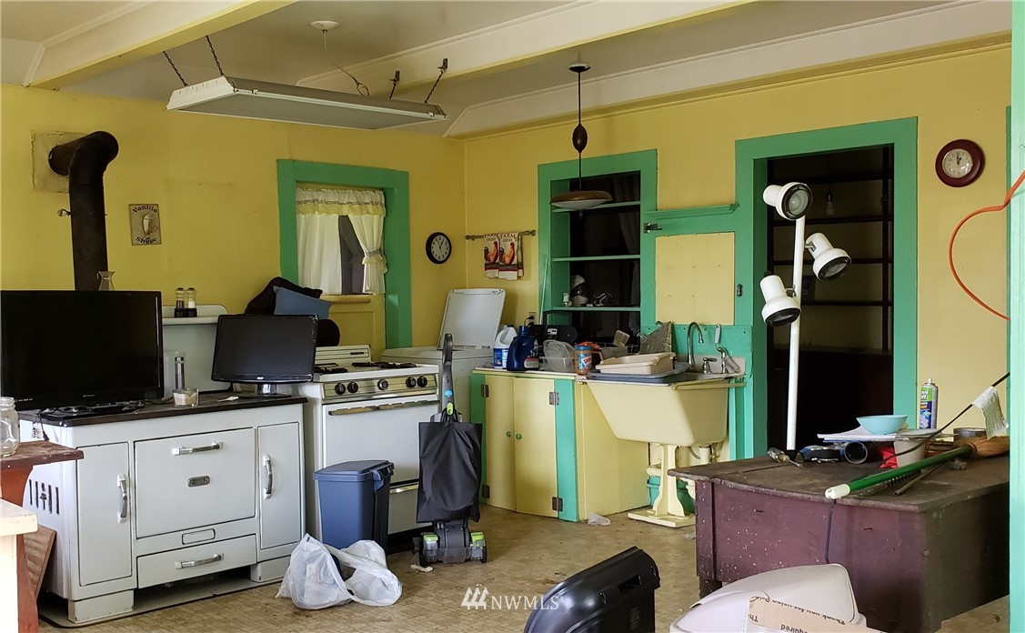 776 West Smith Road Bellingham, WA 98226 - Photo 11 of 29 a view of a kitchen with fridge and workspace