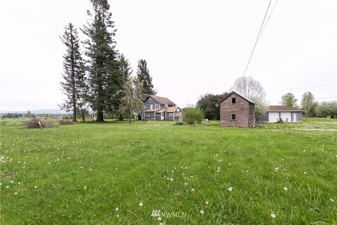 776 West Smith Road Bellingham, WA 98226 - Photo 25 of 29 a front view of a house with garden