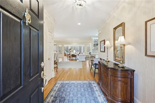 a view of a living room and dining room