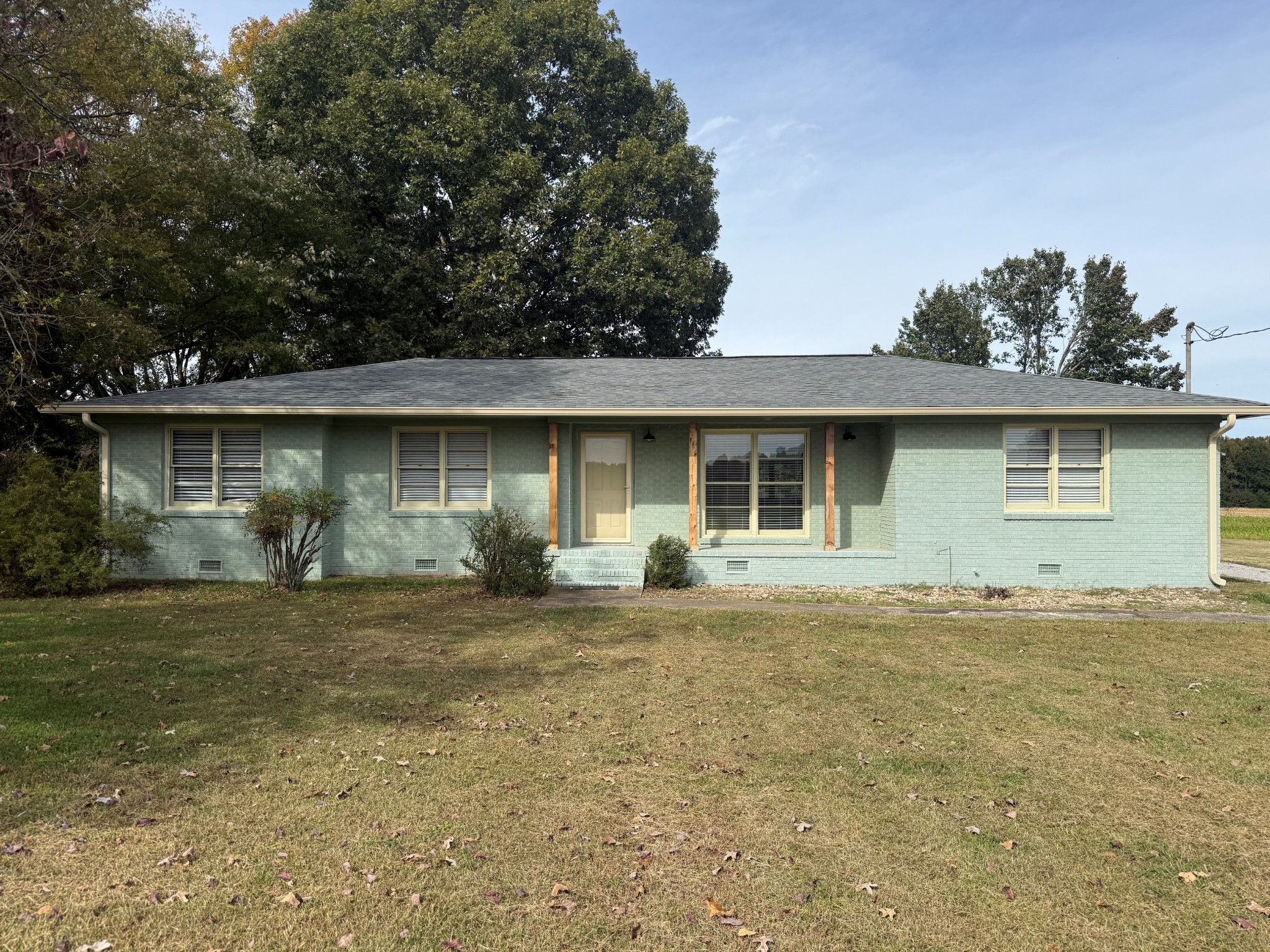 1969 Bobo Section Road Hazel Green, AL 35750 - Photo 1 of 47 a front view of a house with a garden