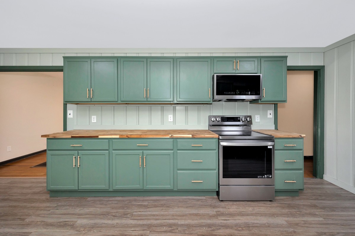 1969 Bobo Section Road Hazel Green, AL 35750 - Photo 25 of 47 a kitchen with a sink and a microwave