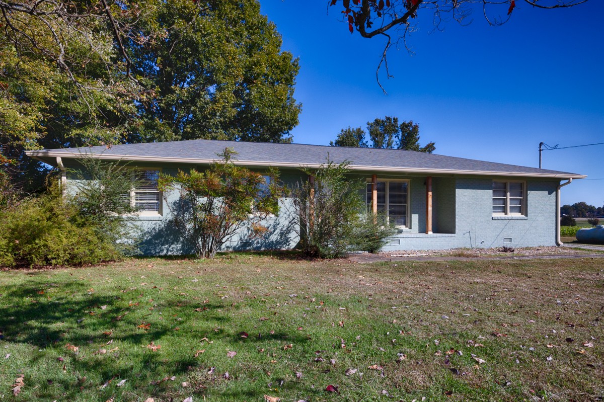 1969 Bobo Section Road Hazel Green, AL 35750 - Photo 36 of 47 a view of a house with backyard and garden