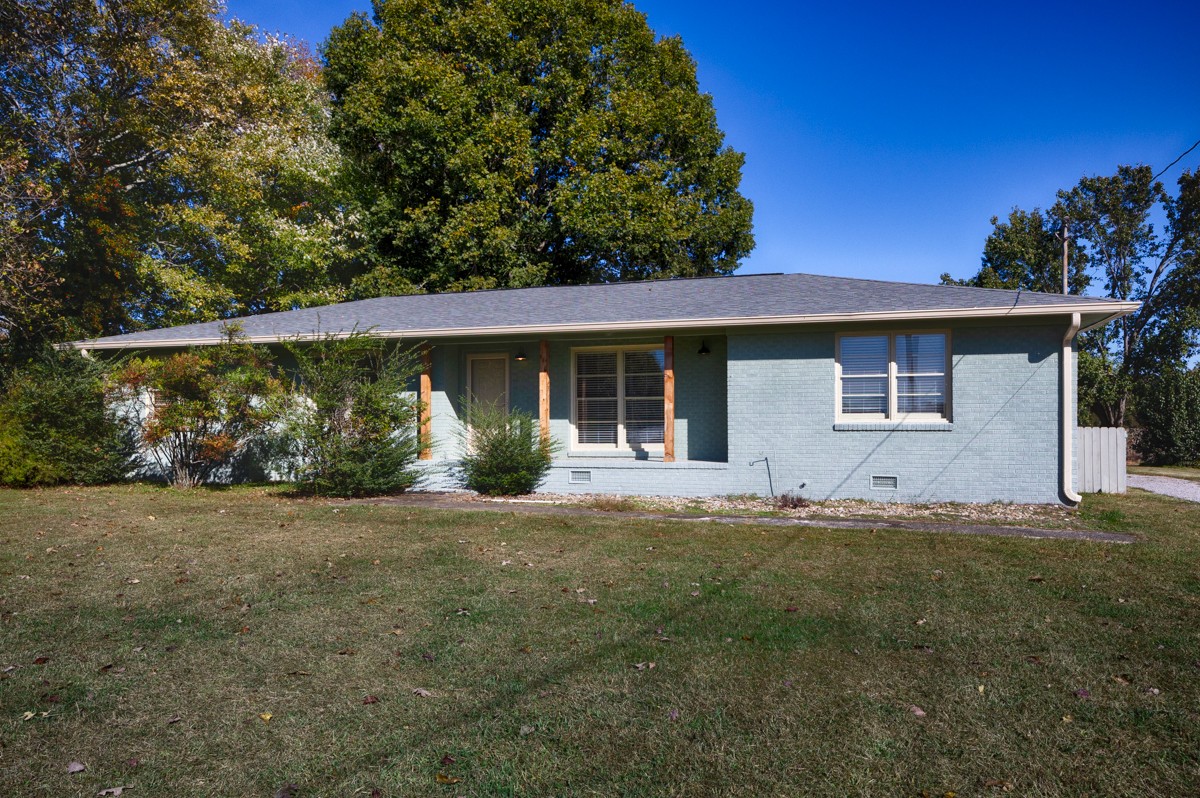 1969 Bobo Section Road Hazel Green, AL 35750 - Photo 37 of 47 a front view of a house with a garden