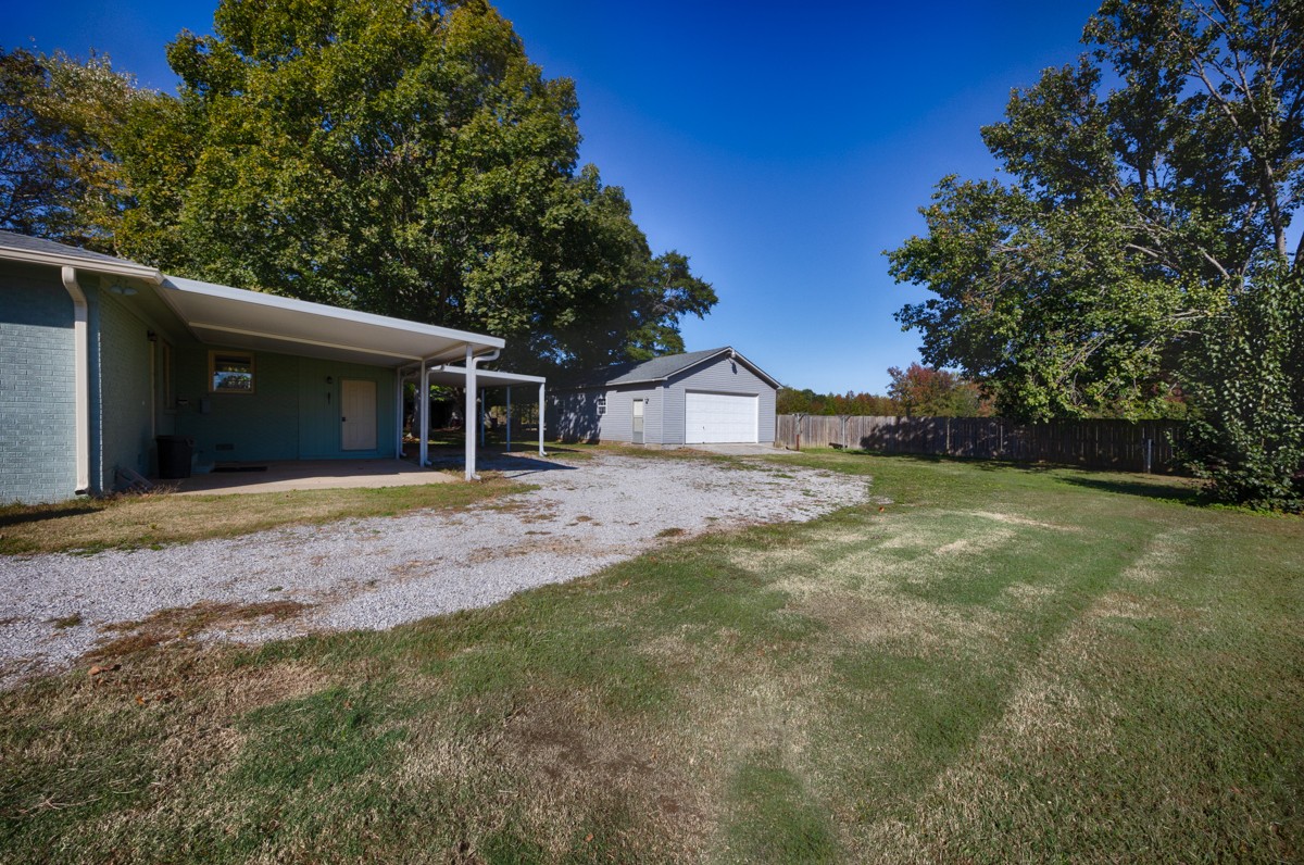 1969 Bobo Section Road Hazel Green, AL 35750 - Photo 40 of 47 a view of house with backyard and tree
