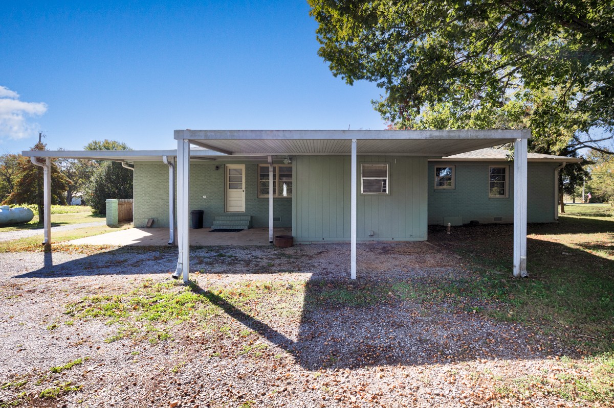 1969 Bobo Section Road Hazel Green, AL 35750 - Photo 42 of 47 a view of a house with backyard porch and sitting area