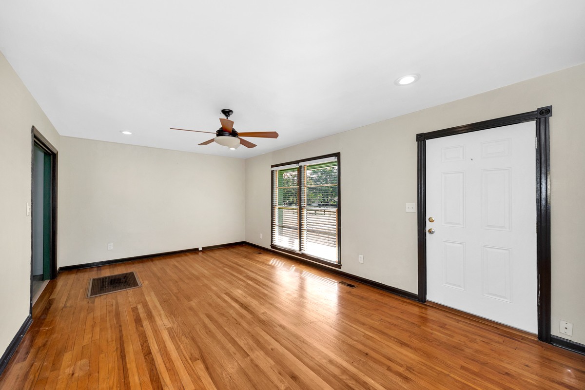 1969 Bobo Section Road Hazel Green, AL 35750 - Photo 6 of 47 wooden floor in an empty room with a window