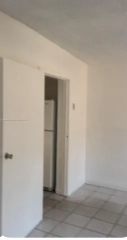 a bathroom with a toilet sink and shower