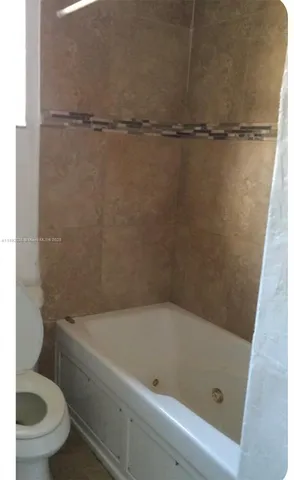 a view of a backyard with tree s