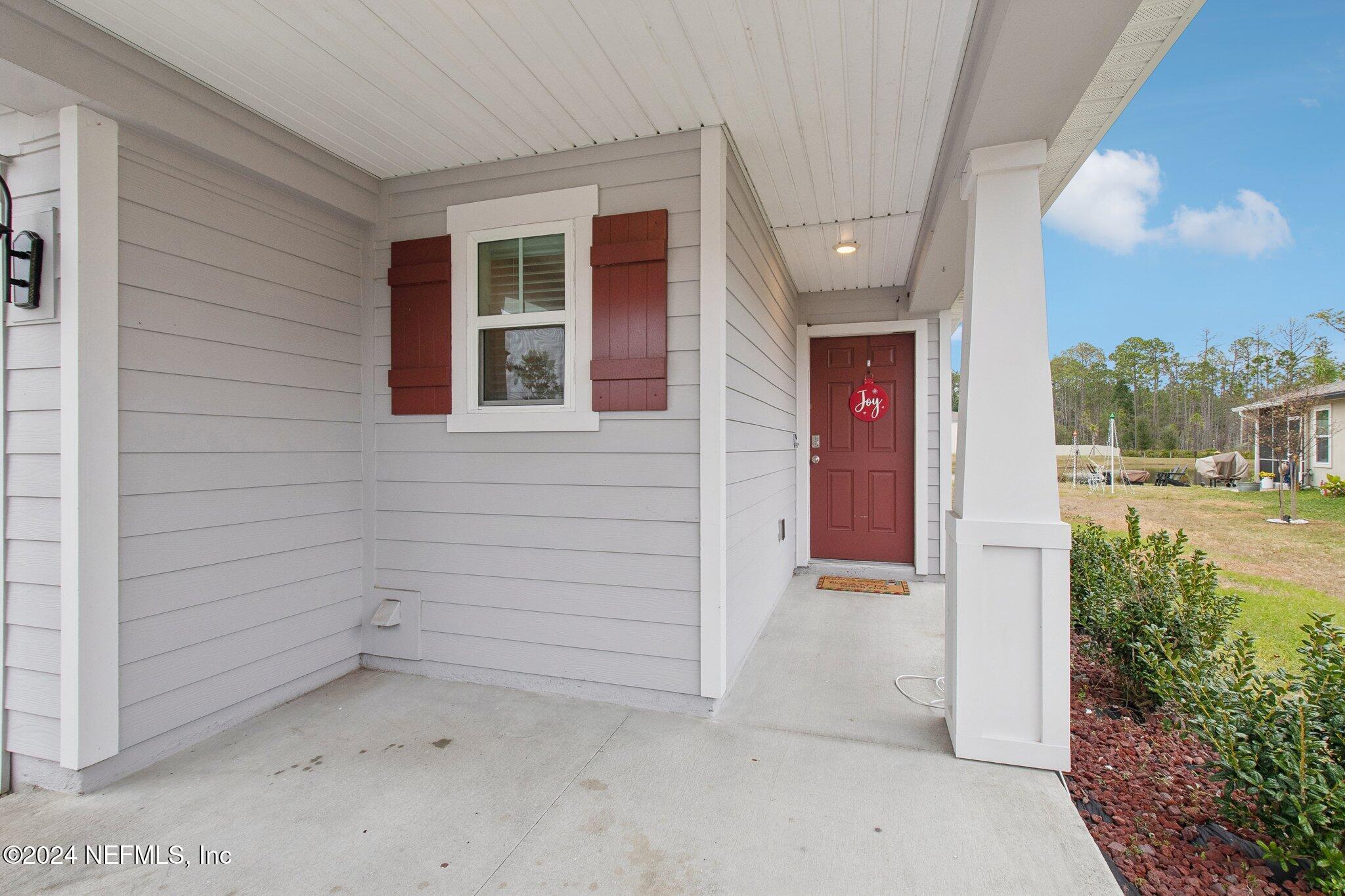 86253 Mainline Road Yulee, FL 32097 - Photo 4 of 39 a view of a porch