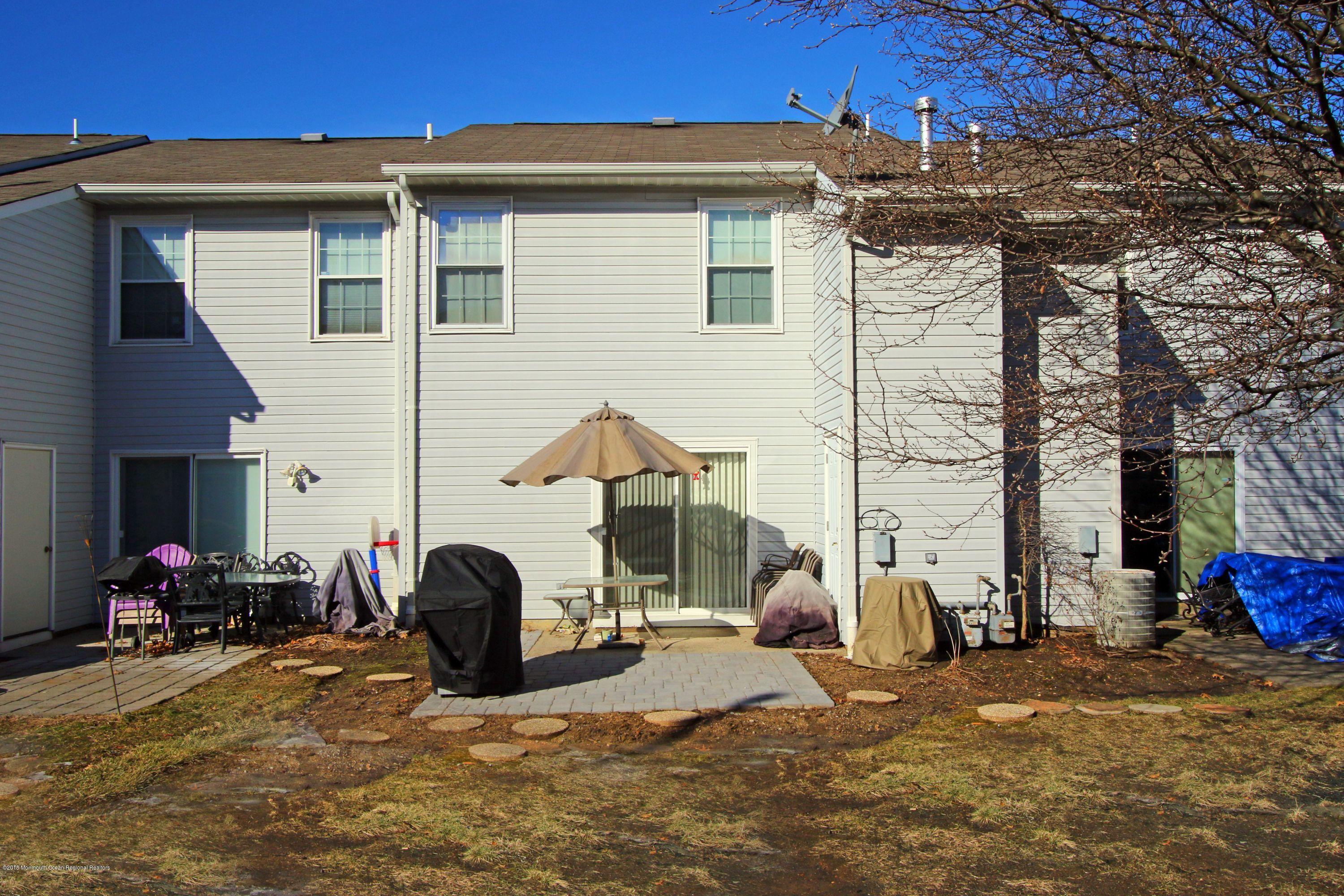 60 County Road, Unit F029 Cliffwood, NJ 07721 - Photo 21 of 33 Back Yard with Patio