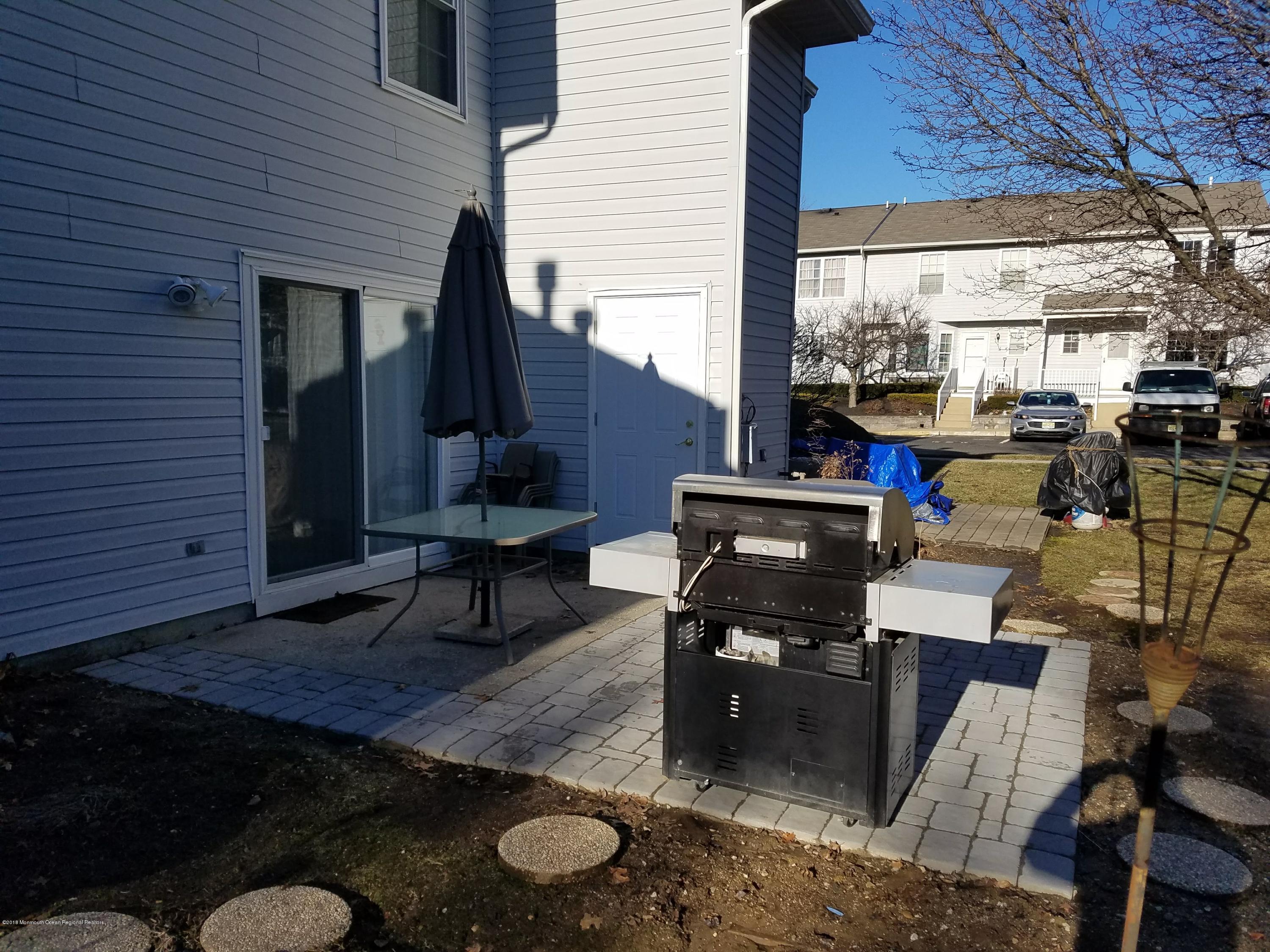 60 County Road, Unit F029 Cliffwood, NJ 07721 - Photo 31 of 33 New Patio and BBQ Area