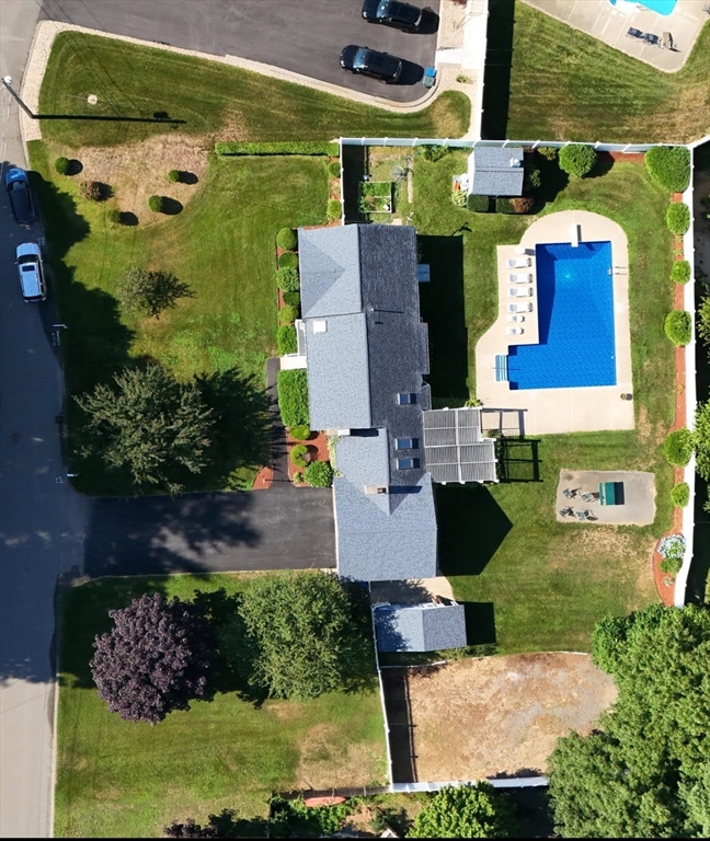 59 Breckenridge Road Tewksbury, MA 01876 - Photo 2 of 42 an aerial view of a house with a garden