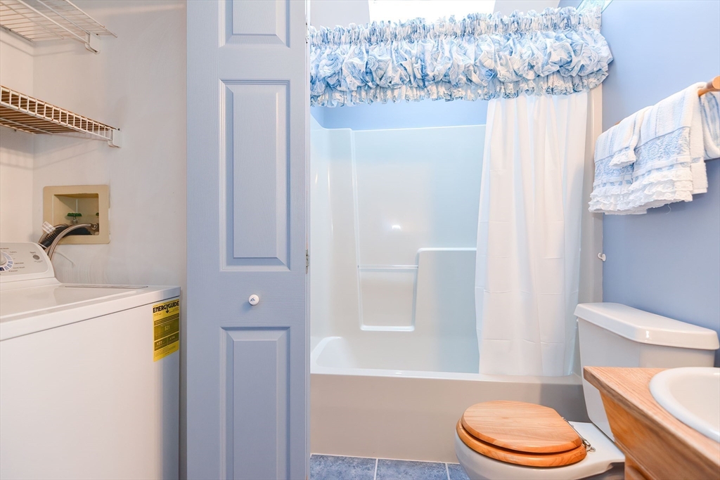 59 Breckenridge Road Tewksbury, MA 01876 - Photo 31 of 42 a bathroom with a toilet a sink and shower