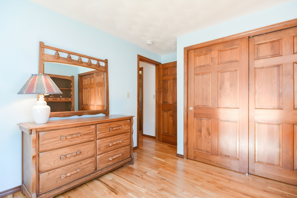 59 Breckenridge Road Tewksbury, MA 01876 - Photo 34 of 42 a room with a dresser and a mirror