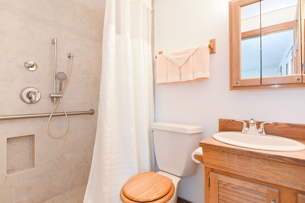 59 Breckenridge Road Tewksbury, MA 01876 - Photo 37 of 42 a bathroom with a sink toilet and shower