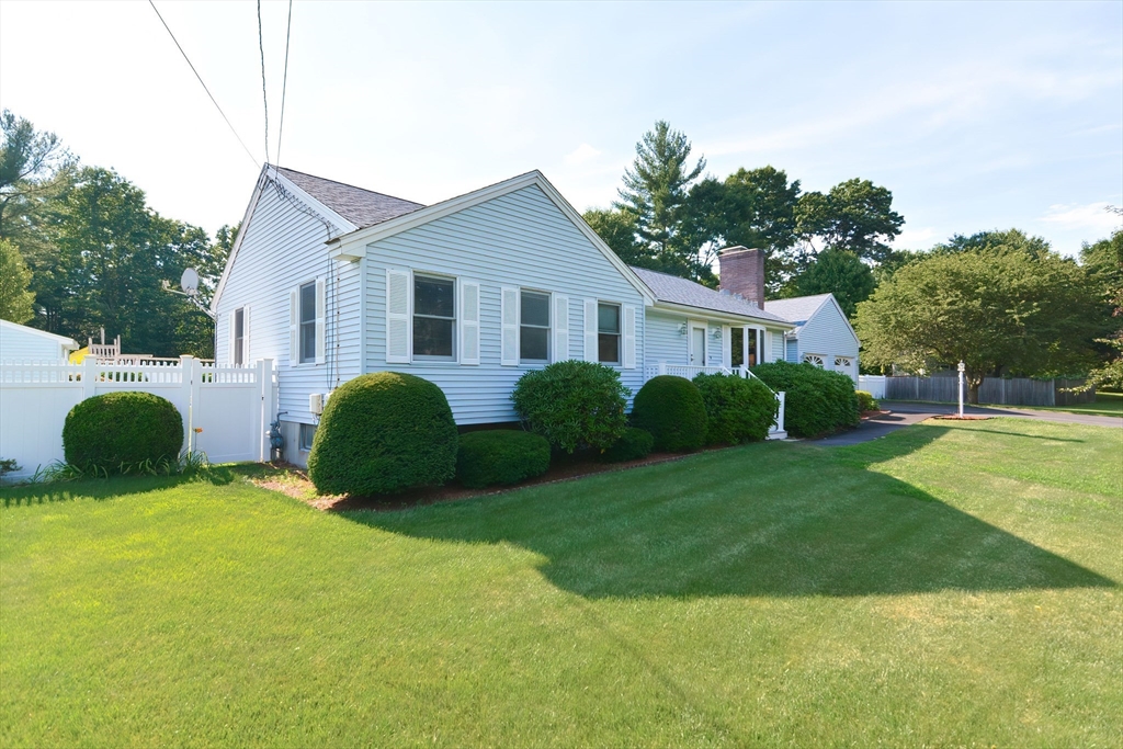 59 Breckenridge Road Tewksbury, MA 01876 - Photo 4 of 42 a view of a house with backyard and garden