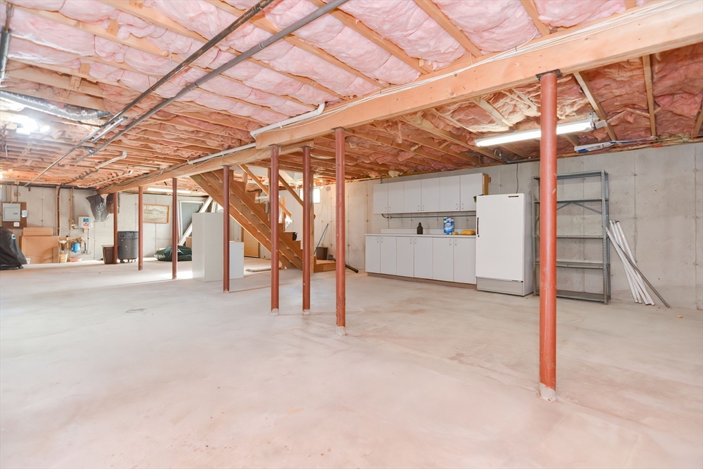 59 Breckenridge Road Tewksbury, MA 01876 - Photo 41 of 42 a view of a room with stairs