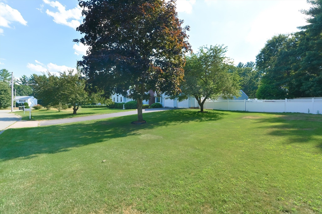 59 Breckenridge Road Tewksbury, MA 01876 - Photo 7 of 42 a view of outdoor space with garden and trees