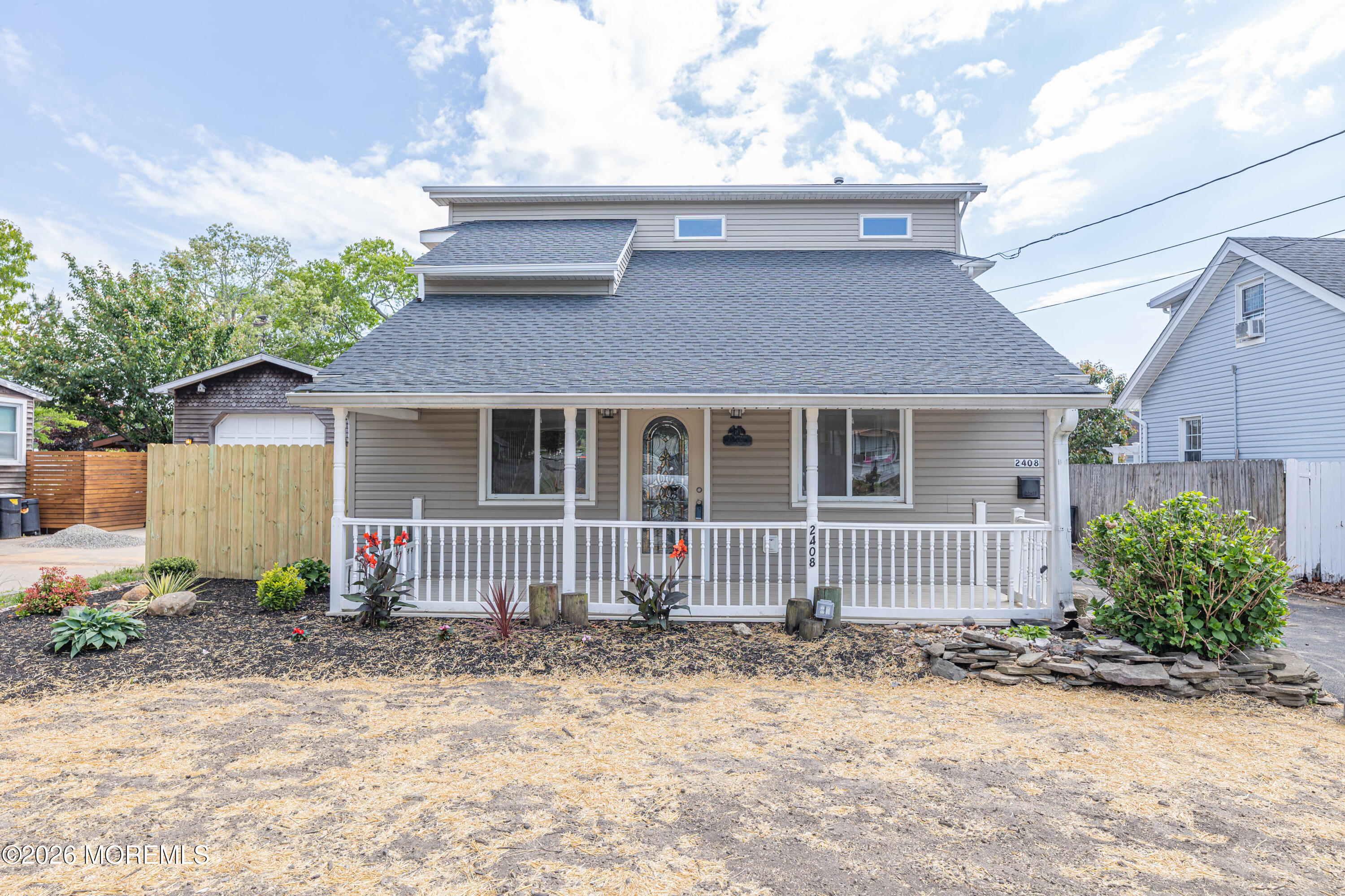 2408 Herbertsville Road Point Pleasant, NJ 08742 - Photo 68 of 82 a front view of a house with garden